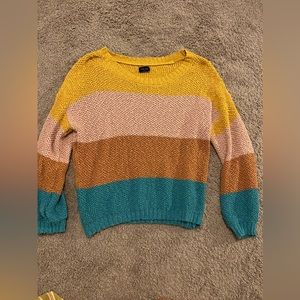 This is a sweater from a local boutique, it is a size medium!